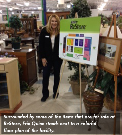Image of Erin Quinn surrounded by some of the items that are for sale at ReStore.