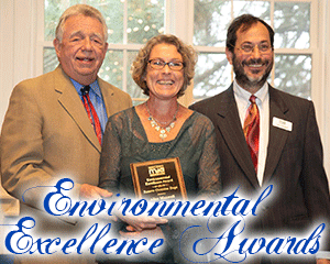 image of Alison Maxwell accepting award from Frank Druetzler and Larry Gindoff