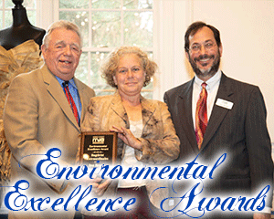 image of Ina Braun accepting award from Frank Druetzler and Larry Gindoff