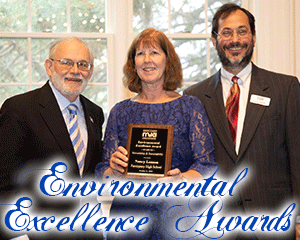 image of Nancy Lennon accepting award from Bill Hudzik and Larry Gindoff