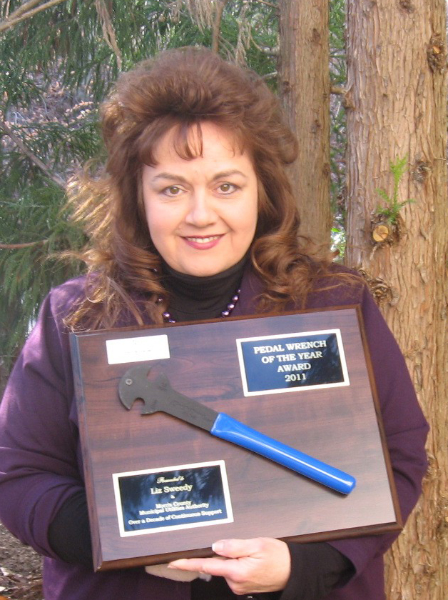 Liz Sweedy, Morris County's District Recycling Coordinator, has retired after 26 years of service to the County.  She is pictured with a Clean Communities Award for outstanding service.