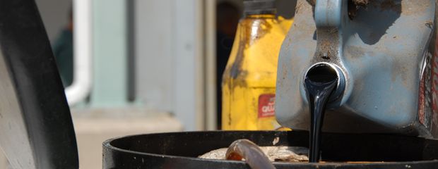Pouring Used Motor Oil